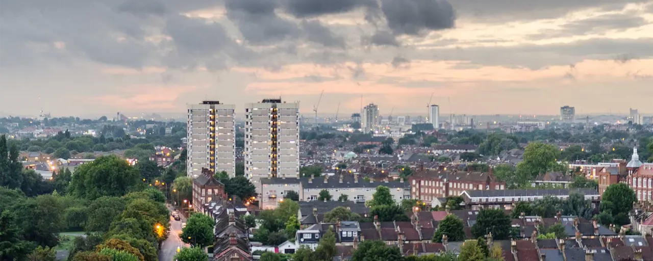 View of housing in a town with gloomy skies.