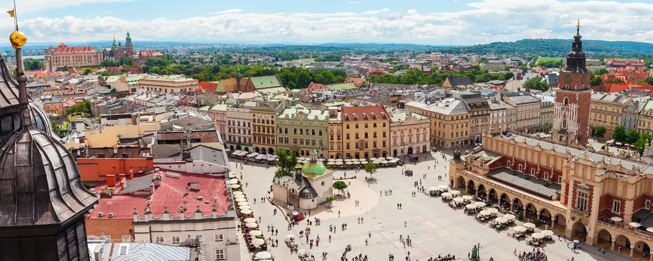 Aerial view on the central square and Sukiennice in Krakow. Market Square from the tower of the church of St. Mary. Poland. Cloth Hall.