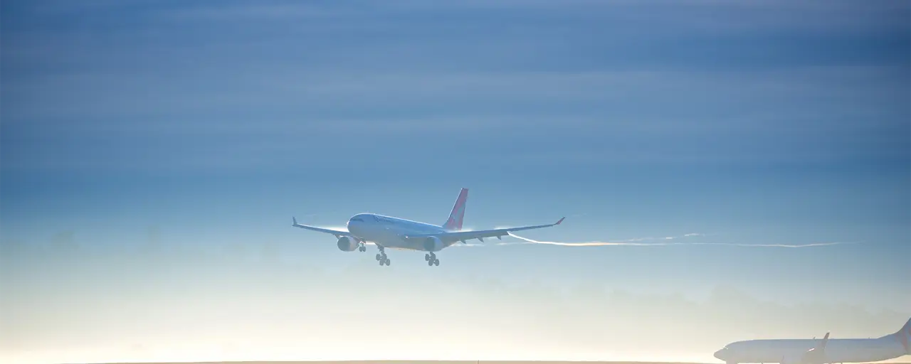 View of an airplane in the sky.