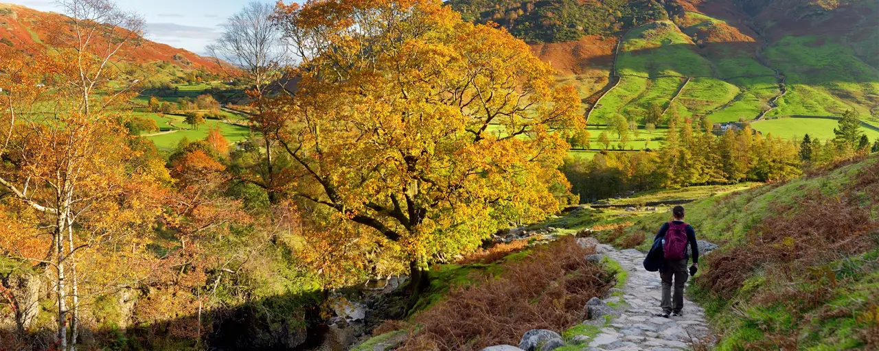 Male hiker exploring the Great Langdale Valley in the Lake District