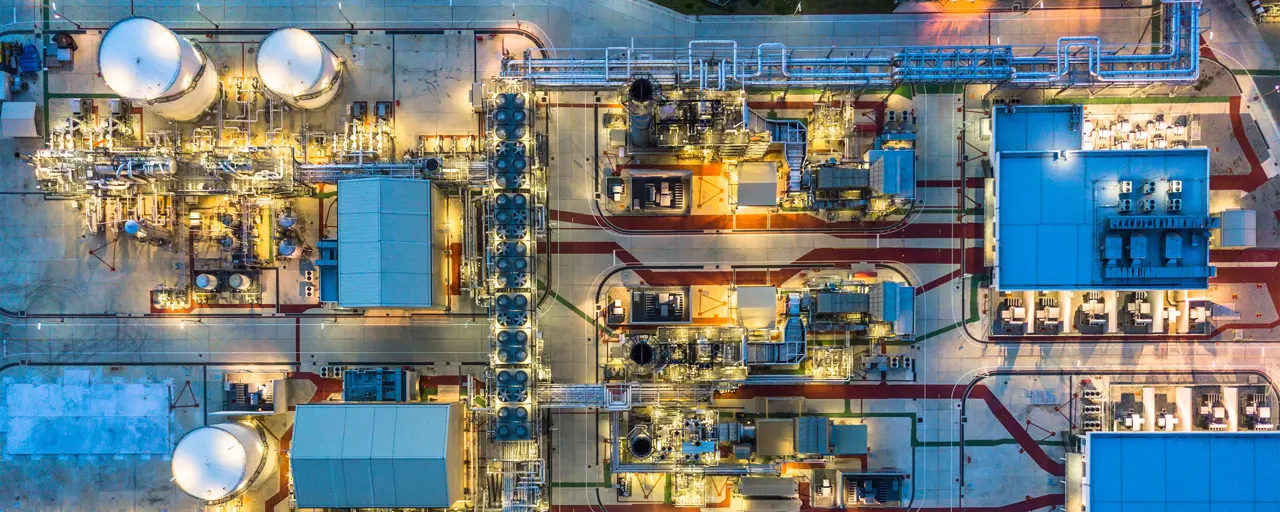 Aerial view of an oil and gas refinery during nightime