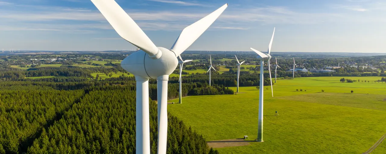 Wind turbines on a green field