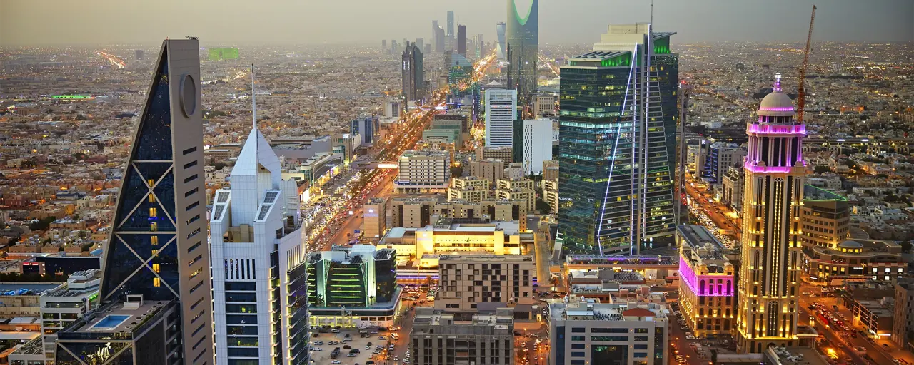 High angle view of central business, finance, and residential districts at dusk