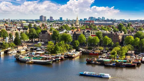 Panoramic aerial view of Amsterdam in a beautiful summer day, The Netherlands