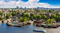 Panoramic aerial view of Amsterdam in a beautiful summer day, The Netherlands